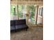 Cozy sun room with lots of natural light and view of private backyard at 938 Lost Valley Se Dr, Conyers, GA 30094