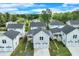 Aerial view showing the neighborhood with backyard garages and spacious yards at 1294 Six Sisters St, Dacula, GA 30019