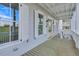 Balcony features classic white railings and exterior lights at 1294 Six Sisters St, Dacula, GA 30019