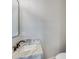 Bathroom sink and vanity features granite countertops at 1294 Six Sisters St, Dacula, GA 30019