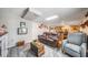 Finished basement featuring modern neutral colors, comfortable seating, and custom finishes throughout the space at 1975 Fairway Close Ter, Lawrenceville, GA 30043