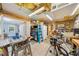 Unfinished garage with exposed ceiling, work bench, and multiple entrances at 1975 Fairway Close Ter, Lawrenceville, GA 30043