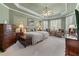 Comfortable bedroom with two beds, sitting area, and plenty of space at 2117 Stephens Walk, Dunwoody, GA 30338