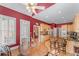 Eat-in kitchen with a round table, chairs, lots of light, and warm wood floors at 2117 Stephens Walk, Dunwoody, GA 30338