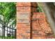 Close-up view of a brick entrance with the community name 'Stephen's Walk' plaque at 2117 Stephens Walk, Dunwoody, GA 30338