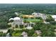 Scenic aerial view of a neighborhood featuring mature trees and convenient access to nearby amenities at 2117 Stephens Walk, Dunwoody, GA 30338