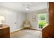 Sitting room features a chair and a large window at 380 Lamplighter Se Ln, Marietta, GA 30067