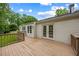The home features a deck with railing, windows and door to the house at 380 Lamplighter Se Ln, Marietta, GA 30067