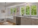 Bright kitchen with stainless appliances, large windows, and a breakfast nook at 380 Lamplighter Se Ln, Marietta, GA 30067