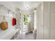Traditional mudroom with brick floors, ample storage, bench seating and convenient access to the outdoors at 380 Lamplighter Se Ln, Marietta, GA 30067