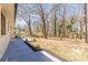 Backyard patio and backyard with lots of trees at 442 Mountain Park Trl, Stone Mountain, GA 30087