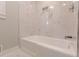Stylish bathroom boasts walk-in shower with marble tile, sleek fixtures, and a relaxing soaking tub at 442 Mountain Park Trl, Stone Mountain, GA 30087