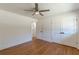 Bedroom with hardwood floors, closet and ceiling fan at 442 Mountain Park Trl, Stone Mountain, GA 30087