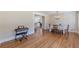 Dining room with hardwood floors and a view of the kitchen at 442 Mountain Park Trl, Stone Mountain, GA 30087