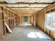 Unfinished basement with exposed framing and concrete floor at 66 Pine Creek Ct, Dallas, GA 30157
