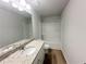 Bathroom features a granite countertop, updated vanity and a shower-tub combo at 66 Pine Creek Ct, Dallas, GA 30157