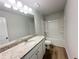 Bathroom featuring a granite countertop, updated vanity and a shower-tub combo at 66 Pine Creek Ct, Dallas, GA 30157