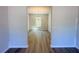 Open layout with wood-look flooring, perfect for entertaining at 66 Pine Creek Ct, Dallas, GA 30157