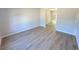 Wood-look flooring in the main living space at 66 Pine Creek Ct, Dallas, GA 30157