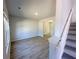 Light filled living area with wood look flooring at 66 Pine Creek Ct, Dallas, GA 30157
