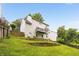 Exterior of the house overlooking the backyard with multiple decks and green landscaping at 1981 Sumter Ct, Lawrenceville, GA 30044