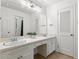 Bright bathroom featuring a double vanity with classic fixtures at 2210 Chrysler Ne Ter, Atlanta, GA 30345