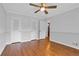 Bedroom boasts hardwood floors and a ceiling fan with and closets at 2210 Chrysler Ne Ter, Atlanta, GA 30345