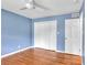 Bedroom features a ceiling fan, hardwood floors, and closet at 2210 Chrysler Ne Ter, Atlanta, GA 30345