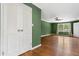 Bedroom with hardwood floors, green walls and a double closet at 2210 Chrysler Ne Ter, Atlanta, GA 30345