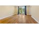 Bright living room with hardwood floors, large window, and neutral colored walls at 2210 Chrysler Ne Ter, Atlanta, GA 30345