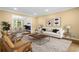 Cozy living room features a neutral palette, plush seating, and modern decor, creating an inviting atmosphere at 2210 Chrysler Ne Ter, Atlanta, GA 30345