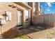 Backyard featuring a door leading into the house with a concrete patio and fenced-in yard at 2735 Sudbury Trce, Norcross, GA 30071
