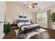 Bright bedroom with vaulted ceiling, large window, and a ceiling fan at 2735 Sudbury Trce, Norcross, GA 30071