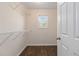 Walk-in closet offers ample storage with wire shelving and a window at 2735 Sudbury Trce, Norcross, GA 30071