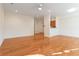 Open-concept living area featuring hardwood floors and ample natural light at 2735 Sudbury Trce, Norcross, GA 30071