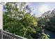 Balcony with lush greenery providing privacy and a serene outdoor space at 11 Perimeter E Ctr # 1412, Atlanta, GA 30346