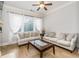 Comfortable living room features neutral decor, hardwood floors, and natural light, creating a welcoming and spacious atmosphere at 11 Perimeter E Ctr # 1412, Atlanta, GA 30346