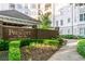 The Prescott at Park Place brick sign nestled among manicured landscaping, providing an appealing and professional community entrance at 11 Perimeter E Ctr # 1412, Atlanta, GA 30346