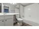 Bathroom includes a single sink vanity, toilet, and bathtub with shower at 135 Pheasant Se Dr, Marietta, GA 30067