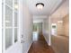Inviting foyer with hardwood floors, leading to bright living spaces at 135 Pheasant Se Dr, Marietta, GA 30067