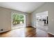 Living room featuring hardwood floors and sliding door access to deck at 135 Pheasant Se Dr, Marietta, GA 30067