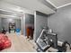 Spacious basement with recreational equipment and storage space at 1709 Grove Se Ct, Conyers, GA 30013