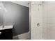 Bathroom featuring tiled shower and modern vanity at 1709 Grove Se Ct, Conyers, GA 30013