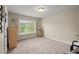 Neutral bedroom with carpet flooring and natural light at 1709 Grove Se Ct, Conyers, GA 30013