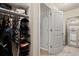 Walk-in closet with custom shelving and ample storage space for accessories at 1709 Grove Se Ct, Conyers, GA 30013