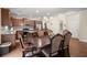 Dining area with hardwood floors and a view into the kitchen at 1709 Grove Se Ct, Conyers, GA 30013