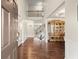 Grand foyer with hardwood floors, high ceilings, and staircase leading to the second floor at 1709 Grove Se Ct, Conyers, GA 30013