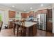 Kitchen featuring stainless appliances and spacious granite island at 1709 Grove Se Ct, Conyers, GA 30013