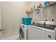 Convenient laundry room with new appliances and storage at 1709 Grove Se Ct, Conyers, GA 30013
