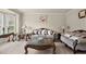Comfortable living room filled with natural light, plush sofas, and stylish decor at 1709 Grove Se Ct, Conyers, GA 30013